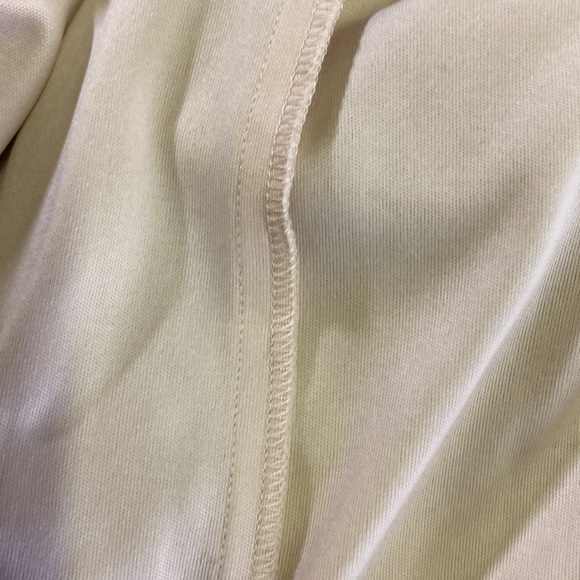 Who doesn’t need some feathers in their life? Beautiful silver cream formal - Picture 11 of 11